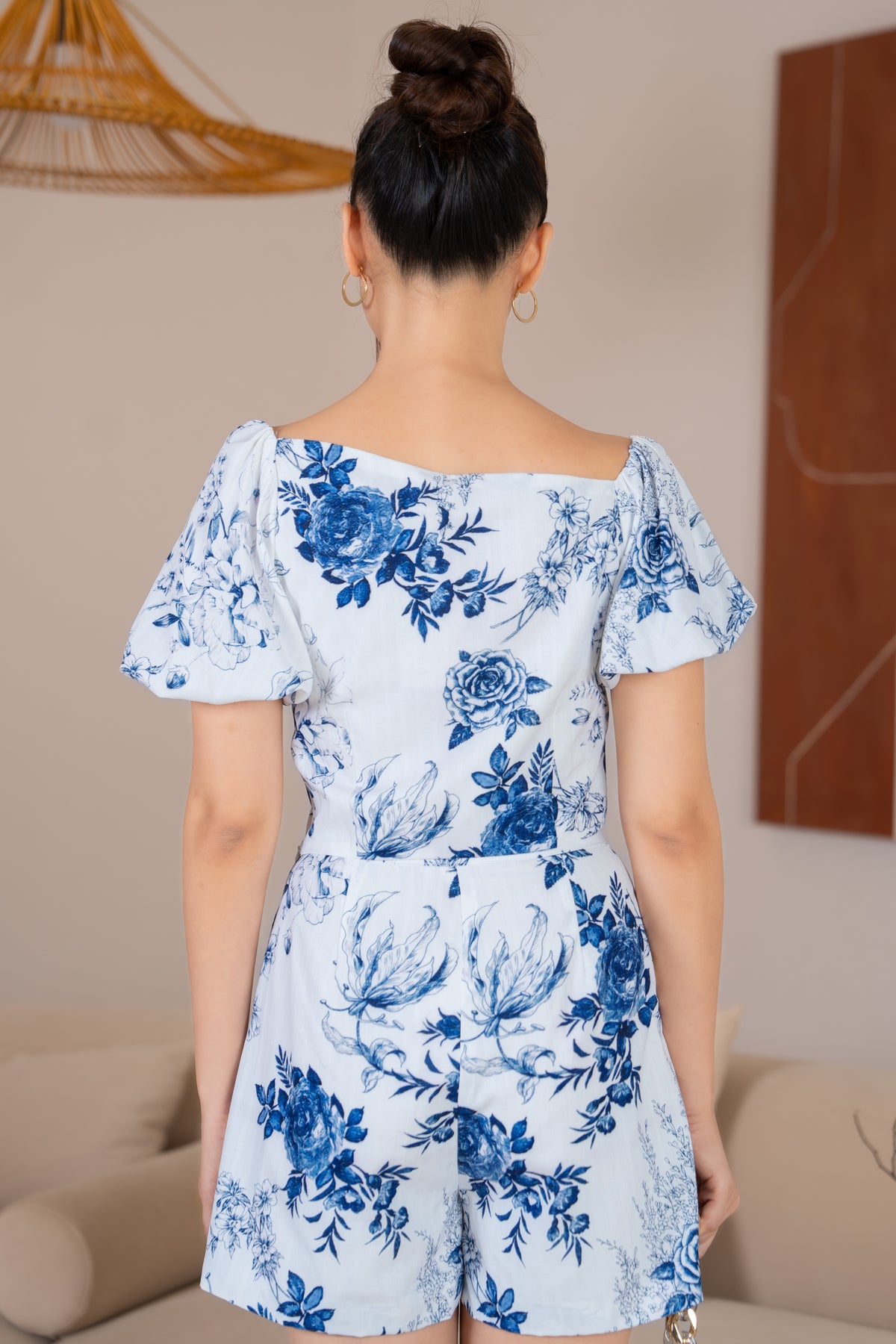 Sandra Pouf Sleeves Slanted Top in Navy Florals