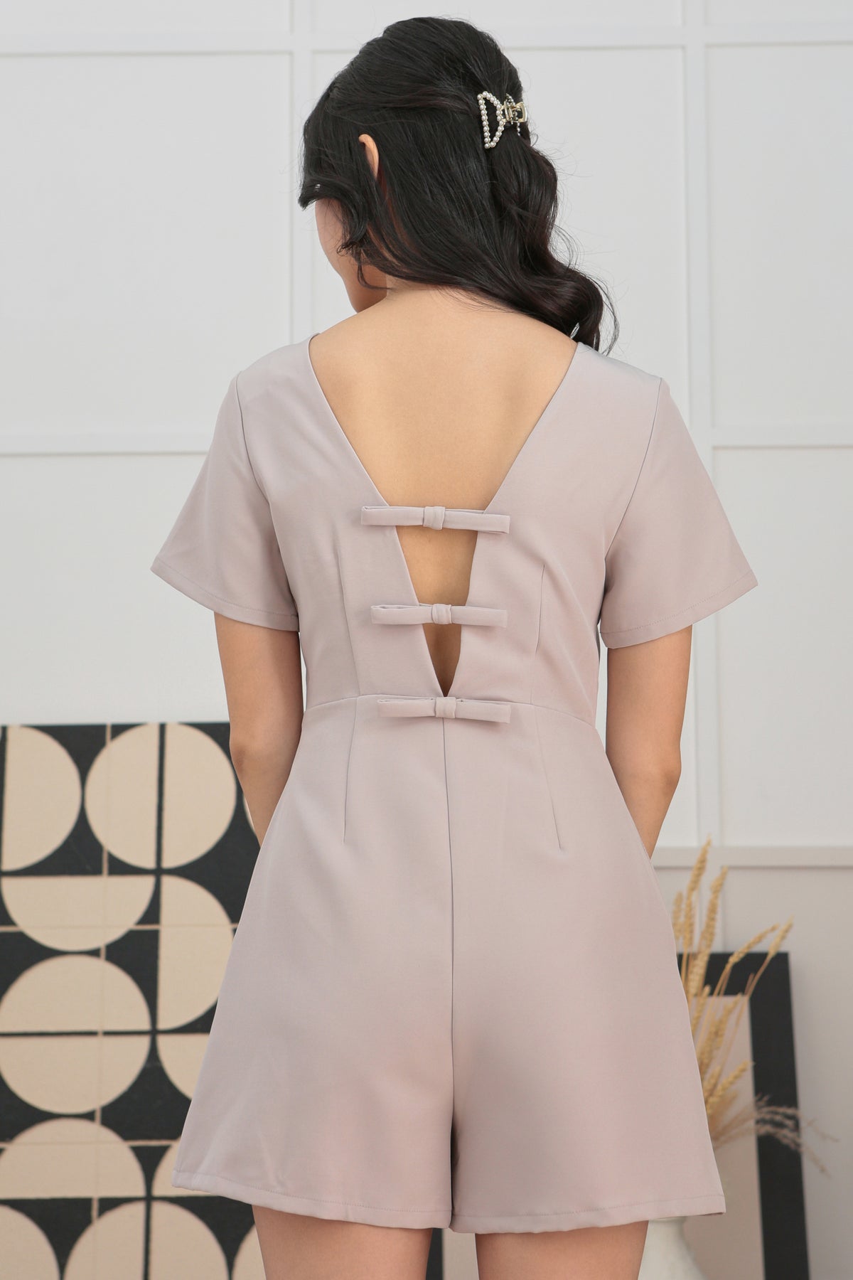 Triple Bow Open-Back Padded Romper in Nude